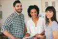 Diversity in design. Portrait of a group of confident young businesspeople working together in a modern office. Royalty Free Stock Photo