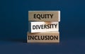 Diversity equity inclusion symbol. Concept words `Diversity equity inclusion` on wooden blocks on beautiful grey background. Royalty Free Stock Photo