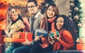 Diversity Friends with Christmas presents and bags shopping in mall Royalty Free Stock Photo