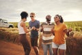 Diversity, friends and dance outdoor on holiday, vacation and relax together on dirt road trip in countryside. Group Royalty Free Stock Photo