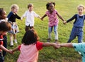 Diversity Group Of Kids Holding Hands in Circle Royalty Free Stock Photo