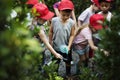 Diversity Group Of Kids Spray Water Garden Royalty Free Stock Photo