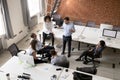 Diversity office workers group listening to leader at company m