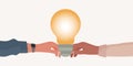 Metaphor. Hand holding a light bulb giving it to another hand. Teaching concept. Teacher coach mentor leader or instructor. Royalty Free Stock Photo