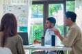 diversity team brainstorming in ESG sustainability business goals sdgs in green office