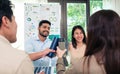 diversity team toasting celebration with reusable bottle of sustainability goals is success at green environment office