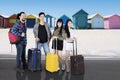 Diversity travelers near the cottage Royalty Free Stock Photo