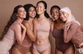 Diversity, women and body positive support in studio for body care wellness, beauty and skincare portrait. Interracial