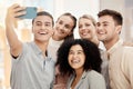 Diversity work, happy group selfie with phone in office for solidarity or team building in marketing startup Royalty Free Stock Photo