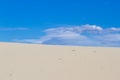 Divided photography on two part with sand and sky. Lands panorama background. Sustainable ecosystem