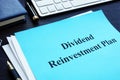 Dividend Reinvestment Plan - DRIP on a desk. Royalty Free Stock Photo