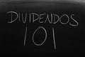 Dividendos 101 On A Blackboard. Translation: Dividends 101