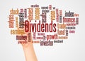 Dividends word cloud and hand with marker concept