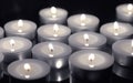 Divine Illumination a Row of Worship Candles Aligned in Reverence Royalty Free Stock Photo