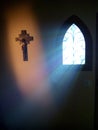 Divine light coming through the window of a church.