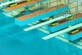 Diving boards in the swimimg pool. Royalty Free Stock Photo