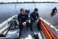 Diving boat floating on the Dnieper river with police lifeguards on duty and equipment aboard