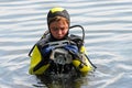 Diving boy controls his diver eyeglasses Royalty Free Stock Photo