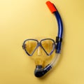 Diving equipment. Snorkeling mask and tube on yellow background. Colorful background Royalty Free Stock Photo