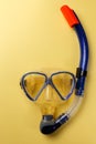 Diving equipment. Snorkeling mask and tube on yellow background. Colorful background Royalty Free Stock Photo