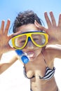 Diving girl in a swimming mask and snorkel Royalty Free Stock Photo