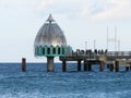 Baltic sea and diving gondola or diving bell at the pier in Zingst on DarÃ Royalty Free Stock Photo