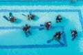 Diving instructor and students. Instructor teaches students to d Royalty Free Stock Photo