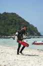 A diving instructor walking passed by