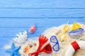 Diving mask and beach toys on blue Royalty Free Stock Photo