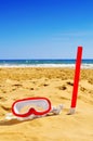 Diving mask and snorkel in the sand of a beach Royalty Free Stock Photo