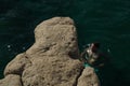 Diving from saint peter pools Malta rock formation hole on rocks