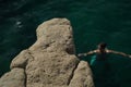 Diving from saint peter pools Malta rock formation hole on rocks