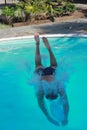Diving into the swimming pool Royalty Free Stock Photo