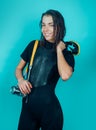 Diving and underwater video shooting. Sexy woman with underwater camera equipment. Sensual underwater diver with wet