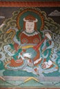 divinity (buddha ?) painted in a monastery (chimi lhakhang) in lobesa (bhutan)