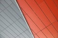 Division of two textures: red metal rightangled tiles and white metal rightangled tiles Royalty Free Stock Photo