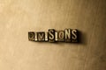 DIVISIONS - close-up of grungy vintage typeset word on metal backdrop