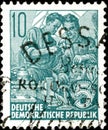 02.11.2020 Divnoe Stavropol Territory Russia the postage stamp GDR 1953 Five-Year Plan two workers Royalty Free Stock Photo