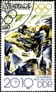 01 16 2020 Divnoe Stavropol Territory Russia postage stamp GDR 1980 Olympic Games - Moscow, USSR swimming swimmer in a water