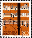 02 10 2020 Divnoe Stavropol Territory Russia the postage stamp Germany 1962 Choral Singing Tuning fork in front of musical
