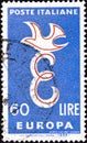 02 08 2020 Divnoe Stavropol Territory Russia postage stamp Italy 1958 EUROPA logo with a dove and the letter E on the blue
