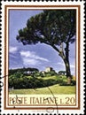 02 10 2020 Divnoe Stavropol Territory Russia postage stamp Italy 1966 Trees and Flowers landscape with a tree against the blue sky