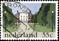 02 10 2020 Divnoe Stavropol Territory Russia postage stamp Netherlands 1981 The Royal Palace in The Hague alley on the facade of a