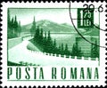 02.09.2020 Divnoe Stavropol Territory Russia postage stamp Romania 1967 Transport Communication mountain landscape with the road