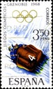 02 10 2020 Divnoe Stavropol Territory Russia postage stamp Spain 1968 Winter Olympic Games - Grenoble, France bobsled bob on a