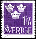 02 11 2020 Divnoe Stavropol Territory Russia postage stamp Sweden 1948 King Gustav V Three Crowns on the purple background