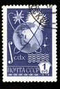 08 12 2019 Divnoe Stavropol Territory Russia postage stamp USSR 1976 communication satellites fly in orbit above a earth