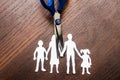 Divorce and child custody scissors cutting family apart