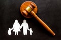 Divorce court concept. Judge gavel near family on black background top-down copy space Royalty Free Stock Photo