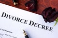 Divorce decree form and faded rose. Royalty Free Stock Photo